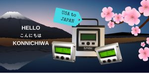 A USB Connect Portable and two USB Connect Pendant Displays overlaid on a clip art drawing of a Japanese lake and mountain. There are clip art sakura flowers on the right.