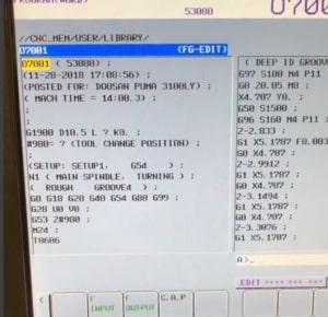 A close up shot of the screen of a Doosan controller, showing the G-code produced by CAD CAM software.