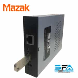 Front angled view of a Floppy Connect Floppy Drive Emulator for Mazak machines, showing a USB drive plugged into its USB port, a Mini-USB port, and a serial port.