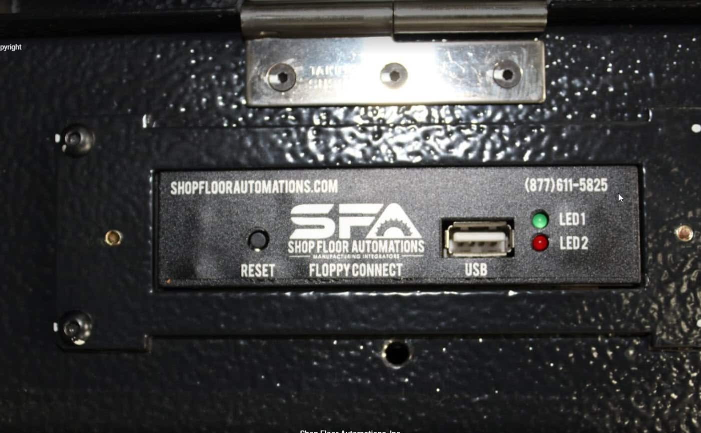 Close up of a Floppy Drive Emulator installed on a Mazatrol 640M CNC machine.